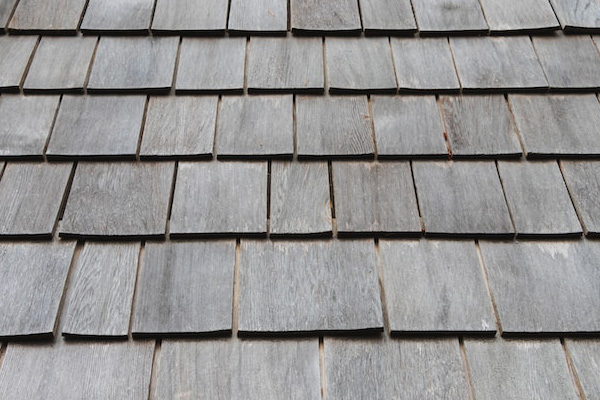 Fixing curling or buckling shingles